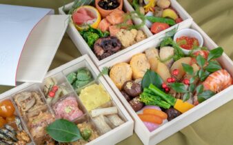 chocolates and fruits on three boxes